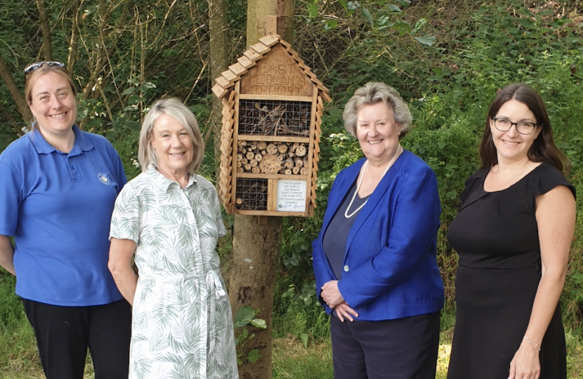 Mrs Preston, ECO Garden, Mrs Fox, Headteacher, Heather Wheeler, Colleen Hempson, the EMA Community Engagement Manager. The Bug Hotel in the picture was gifted to the school by EMA